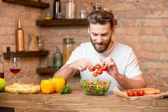 Man making salad royalty free stock image Man making salad royalty free stock image