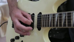 Man play on electric guitar