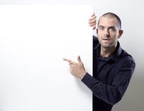 Man Pointing At An Empty Billboard On White Royalty Free Stock Photos Man Pointing At An Empty Billboard On White Royalty Free Stock Photos