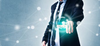 Man pointing finger on virtual screen with technology in business concept and glowing network royalty free stock images Man pointing finger on virtual screen with technology in business concept and glowing network royalty free stock images