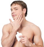 Man putting on cream lotion royalty free stock photos Man putting on cream lotion royalty free stock photos