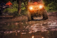 Man riding atv vehicle on off road track ,people outdoor sport a Royalty Free Stock Photo Man riding atv vehicle on off road track ,people outdoor sport a Royalty Free Stock Photo