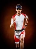 Man runner running triathlon ironman isolated stock images Man runner running triathlon ironman isolated stock images