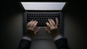 Man`s Hands Working on the Laptop at Night royalty free stock photos Man`s Hands Working on the Laptop at Night royalty free stock photos