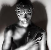 Man S Silver Plated Body In Shadows. Thorns Silhouette. Creative Art Design Royalty Free Stock Image Man S Silver Plated Body In Shadows. Thorns Silhouette. Creative Art Design Royalty Free Stock Image