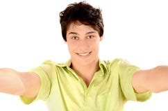 Man smiling with hands reaching out. Happy young man taking a selfie photo. royalty free stock photography Man smiling with hands reaching out. Happy young man taking a selfie photo. royalty free stock photography