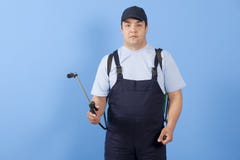 Man spraying insects- pest control Royalty Free Stock Images Man spraying insects- pest control Royalty Free Stock Images