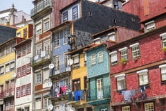 Man standing on balcony of his tiny aparment stock image Man standing on balcony of his tiny aparment stock image
