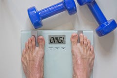 Man standing on scale stock photography Man standing on scale stock photography