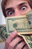 Man Staring At A Wad Of Cash Royalty Free Stock Photography Man Staring At A Wad Of Cash Royalty Free Stock Photography