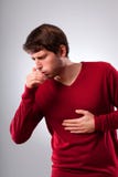 Man suffering from strong cough