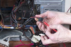 Man is testing the electrical power of personal computer royalty free stock photo Man is testing the electrical power of personal computer royalty free stock photo