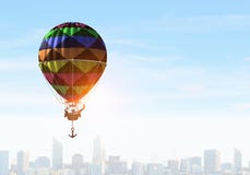 Man traveling in aerostat . Mixed media stock photos Man traveling in aerostat . Mixed media stock photos