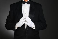 Man in Tuxedo with Hands in Front stock photo Man in Tuxedo with Hands in Front stock photo