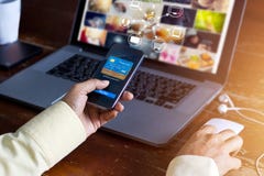 Man using mobile payments online shopping and icon customer network connection on screen, m-banking and omni channel royalty free stock photography Man using mobile payments online shopping and icon customer network connection on screen, m-banking and omni channel royalty free stock photography