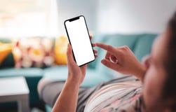 Man using smartphone frameless on sofa royalty free stock images Man using smartphone frameless on sofa royalty free stock images