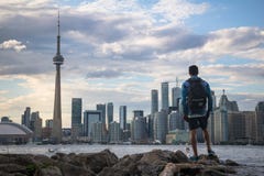 Wide view of man and Toronto skyline royalty free stock images Wide view of man and Toronto skyline royalty free stock images