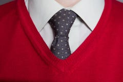 Man wearing white shirt, red sweater stock image Man wearing white shirt, red sweater stock image