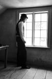 Man by the window royalty free stock photo Man by the window royalty free stock photo