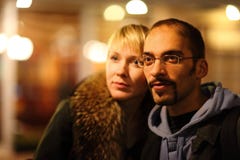 Man and woman is pasearing in coldly night city. Royalty Free Stock Photo Man and woman is pasearing in coldly night city. Royalty Free Stock Photo