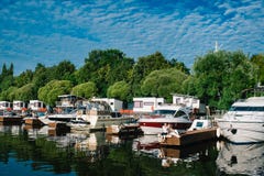 Man and woman relaxing on a berth in yacht club. Stock Photo Man and woman relaxing on a berth in yacht club. Stock Photo