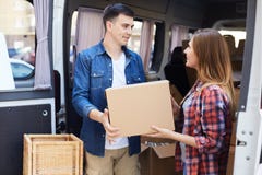 Man and Woman Unloading Moving Van stock photography Man and Woman Unloading Moving Van stock photography