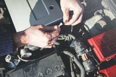 Man working in the car stock photo Man working in the car stock photo