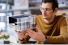 Man working with maquette in design and engineering architecture Royalty Free Stock Photo Man working with maquette in design and engineering architecture Royalty Free Stock Photo