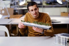 Man working with maquette in design and engineering architecture Royalty Free Stock Image Man working with maquette in design and engineering architecture Royalty Free Stock Image