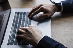 Man using laptop with blank screen royalty free stock photography Man using laptop with blank screen royalty free stock photography