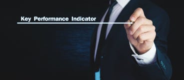 Man writes Key Performance Indicator text on screen. royalty free stock image Man writes Key Performance Indicator text on screen. royalty free stock image
