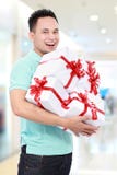 Man wth many gift boxes Royalty Free Stock Image Man wth many gift boxes Royalty Free Stock Image