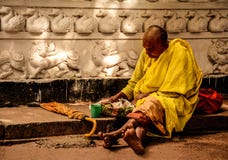 Man in Yellow Sitting Outside during Daytime Royalty Free Stock Photos Man in Yellow Sitting Outside during Daytime Royalty Free Stock Photos