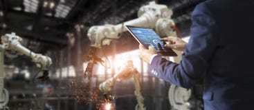 Manager industrial engineer using tablet for checking royalty free stock photography Manager industrial engineer using tablet for checking royalty free stock photography