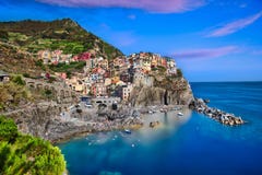 Manarola y puesta del sol Fotos de archivo libres de regalías Manarola y puesta del sol Fotos de archivo libres de regalías
