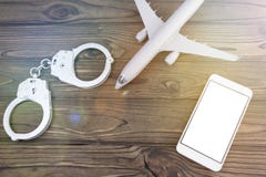 Manette, aereo, smartphone fotografie stock libere da diritti Manette, aereo, smartphone fotografie stock libere da diritti