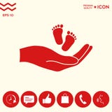 Mani che tengono il piede del bambino Fotografia Stock Libera da Diritti Mani che tengono il piede del bambino Fotografia Stock Libera da Diritti