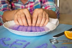 Manicure at home. Woman dipping her hand in a bowl of water. Nail Care. royalty free stock image Manicure at home. Woman dipping her hand in a bowl of water. Nail Care. royalty free stock image