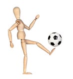 Maniquí de madera con un balón de fútbol imágenes de archivo libres de regalías Maniquí de madera con un balón de fútbol imágenes de archivo libres de regalías