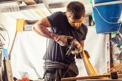 Manmolarmetall en vinkelmolar arkivfoton Manmolarmetall en vinkelmolar arkivfoton