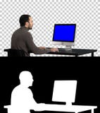 Mann, der auf dem Computer, Alpha Channel schreibt Blue Screen-Modell-Anzeige stockfotografie Mann, der auf dem Computer, Alpha Channel schreibt Blue Screen-Modell-Anzeige stockfotografie