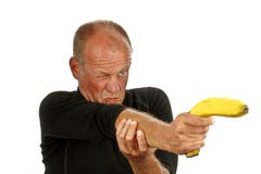 Mann, der seine Bananengewehr zeigt lizenzfreies stockbild Mann, der seine Bananengewehr zeigt lizenzfreies stockbild
