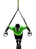 Mann, der Suspendierungstraining trx Schattenbild ausübt stockbild Mann, der Suspendierungstraining trx Schattenbild ausübt stockbild