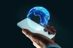 Mano con el holograma del smartphone y de la tierra Imagen de archivo Mano con el holograma del smartphone y de la tierra Imagen de archivo