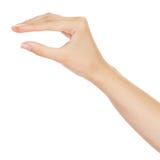 Mano de la mujer que mide items invisibles imagenes de archivo Mano de la mujer que mide items invisibles imagenes de archivo
