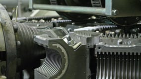Manufacture of plastic water pipes. Manufacturing of tubes to the factory. The process of making plastic pipes on the royalty free stock images Manufacture of plastic water pipes. Manufacturing of tubes to the factory. The process of making plastic pipes on the royalty free stock images