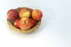 Many apples in the basket isolated on white background. The right side there is space for writing text stock images Many apples in the basket isolated on white background. The right side there is space for writing text stock images