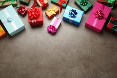 Many Colorful Gift Boxes On Grey Table, Above View. Space For Text Royalty Free Stock Photos