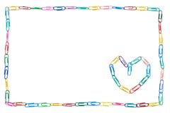 Colorful frame made of paper clips on white background with heart for colleague stock image Colorful frame made of paper clips on white background with heart for colleague stock image