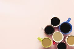 Many of multi-colored cups of coffee and coffee drinks on a pink background. Concept breakfast with coffee, coffee with friends. royalty free stock photo Many of multi-colored cups of coffee and coffee drinks on a pink background. Concept breakfast with coffee, coffee with friends. royalty free stock photo